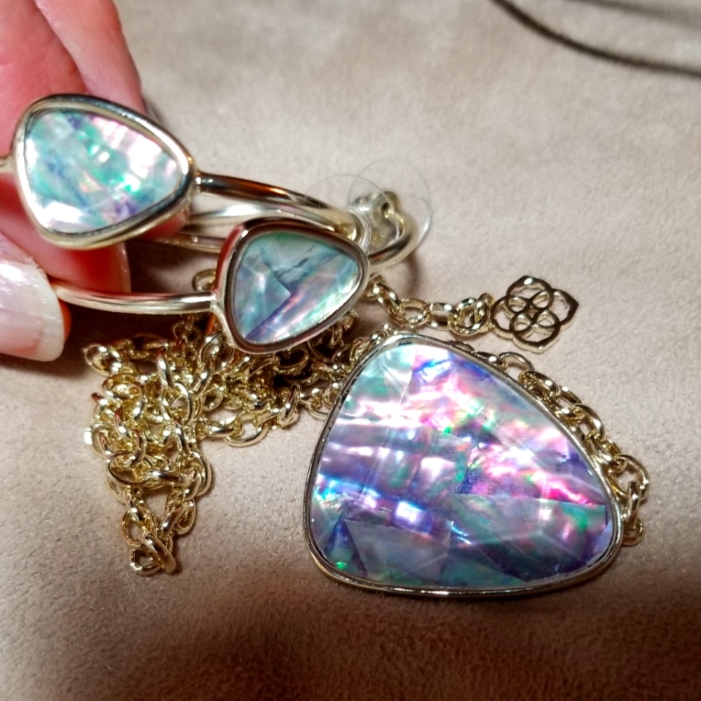 Beautiful Kendra Scott necklace and earring set, new with pouch.